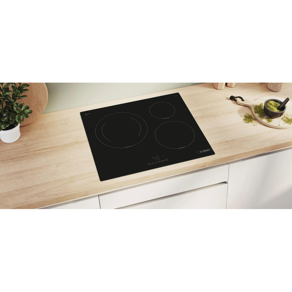 Индукционная варочная панель Bosch PUJ611BB5E